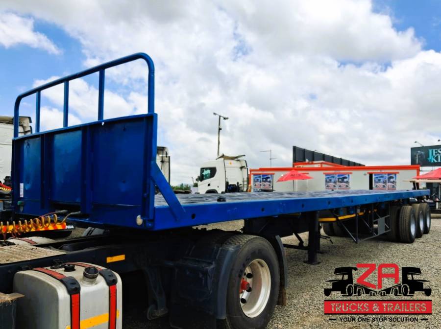 Paramount, TRI-AXLE FLAT DECK TRAILER [#52682], Flat Deck Trailer, Used, 2013