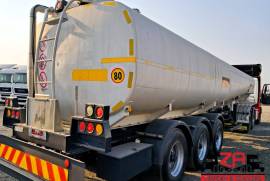 Tank Clinic, TRI-AXLE FUEL TANKER [#52370], Diesel Trailer, Used, 2003