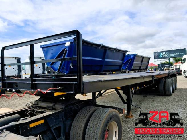 Henred, TRI-AXLE FLAT DECK [#52695], Flat Deck Trailer, Used, 2006